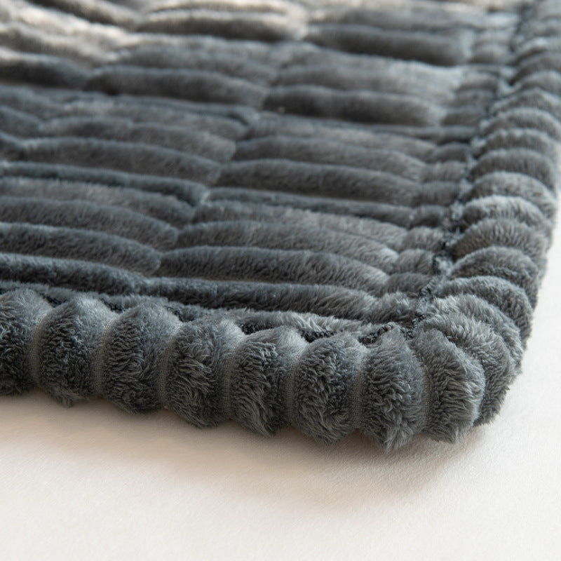 Close-up of the quilted chenille edge of the sofa cover